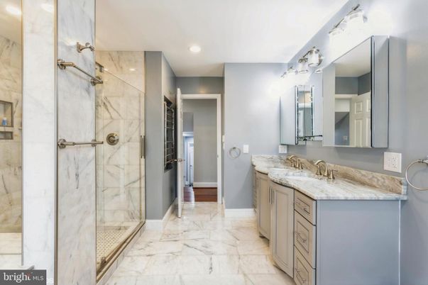 Bathroom, Dual Sink Vanities, Glass Shower, Interior, Marble, Marble Walls, Recessed Lighting