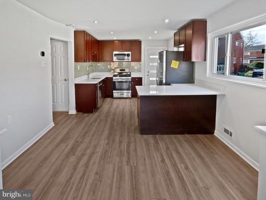 Interior, Kitchen, Recessed Lighting, Stainless Steel Appliances, Wood Texture Flooring