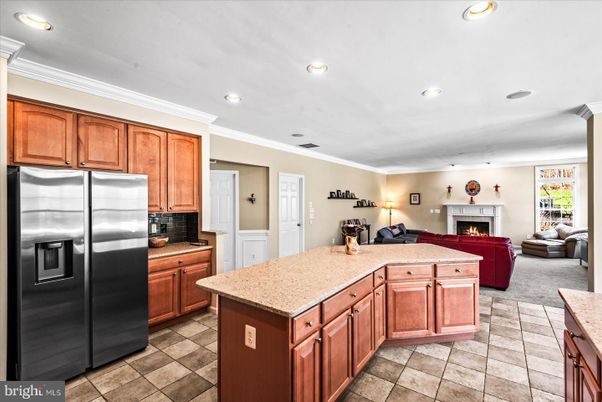 Fireplace, Interior, Kitchen, Living room, Recessed Lighting, Stainless Steel Appliances