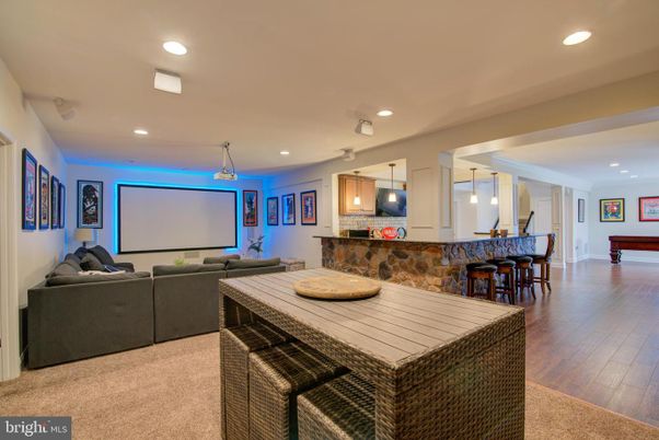Interior, Living room, Pendant Lights, Projection Screen, Recessed Lighting, Wood Texture Flooring