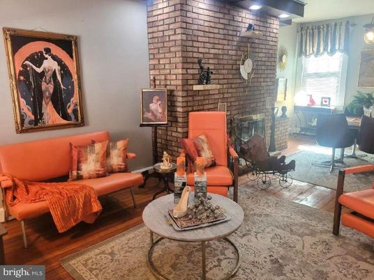Fireplace, Interior, Living room, Recessed Lighting, Stone Walls, Wood Texture Flooring