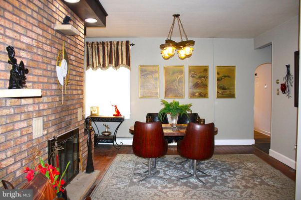 Dining room, Fireplace, Interior, Pendant Lights, Stone Walls, Wood Texture Flooring