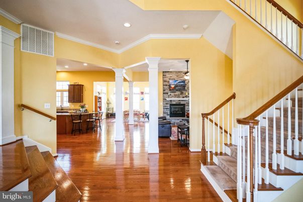 Fireplace, Interior, Kitchen, Pendant Lights, Recessed Lighting, Stone Walls, Wood Texture Flooring