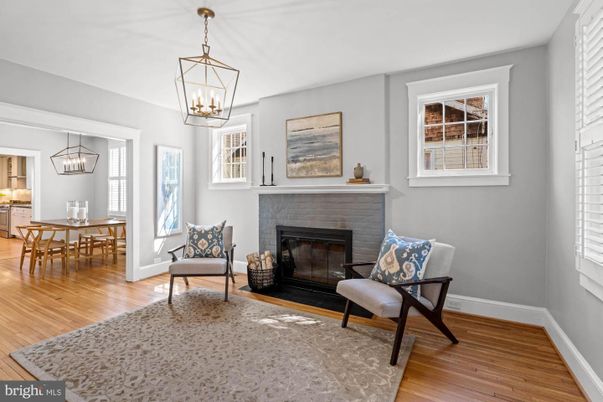 Dining room, Fireplace, Interior, Pendant Lights, Wood Texture Flooring