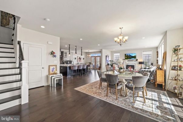 Chandelier, Dining room, Fireplace, Interior, Kitchen, Living room, Pendant Lights, Recessed Lighting, Wood Texture Flooring