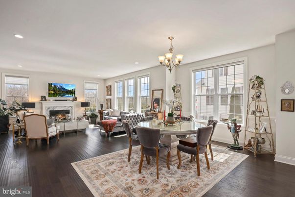 Chandelier, Dining room, Fireplace, Interior, Living room, Recessed Lighting, Wood Texture Flooring