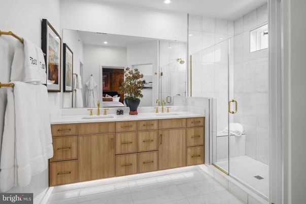 Bathroom, Dual Sink Vanities, Glass Shower, Interior, Marble, Marble Walls, Recessed Lighting