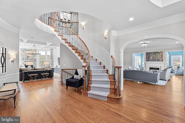 Chandelier, Fireplace, Interior, Living room, Recessed Lighting, Wood Texture Flooring
