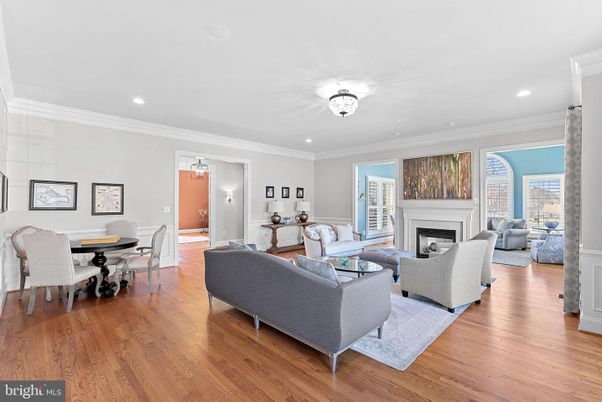Dining room, Fireplace, Interior, Living room, Pendant Lights, Recessed Lighting, Wood Texture Flooring