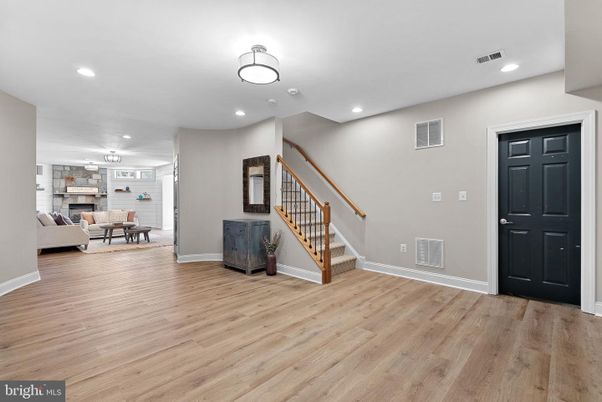 Dining room, Fireplace, Interior, Living room, Recessed Lighting, Wood Texture Flooring