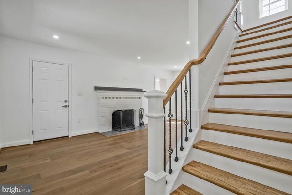 Fireplace, Interior, Recessed Lighting, Wood Texture Flooring