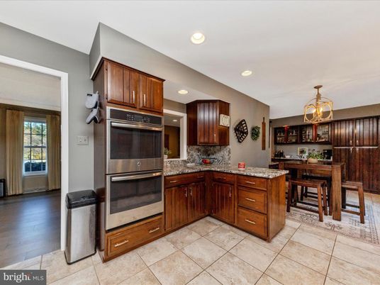Dining room, Interior, Kitchen, Recessed Lighting, Stainless Steel Appliances, Wood Texture Flooring