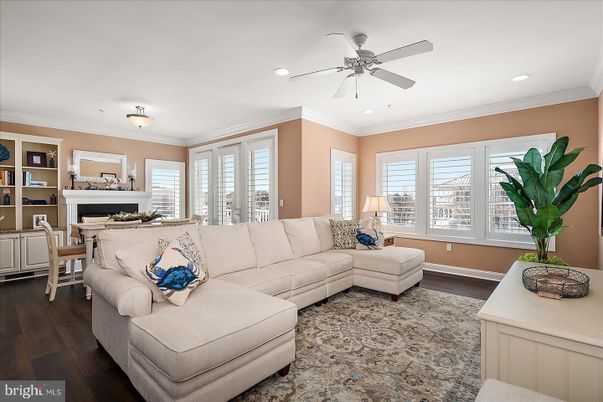 Dining room, Fireplace, Interior, Living room, Recessed Lighting, Wood Texture Flooring