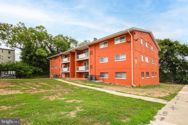 Backyard, Exterior, Facade, Brick Facade, Condo Building