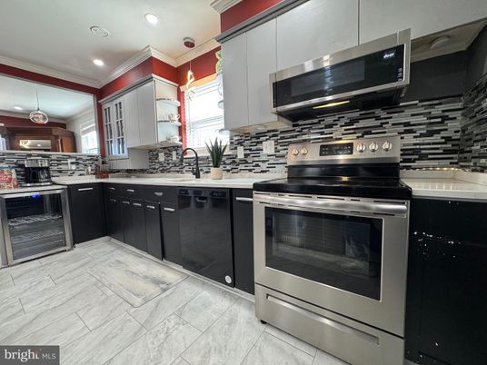 Interior, Kitchen, Marble, Pendant Lights, Recessed Lighting, Stainless Steel Appliances, Wood Texture Flooring