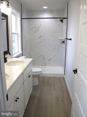 Bathroom, Interior, Marble Walls, Recessed Lighting, Wood Texture Flooring