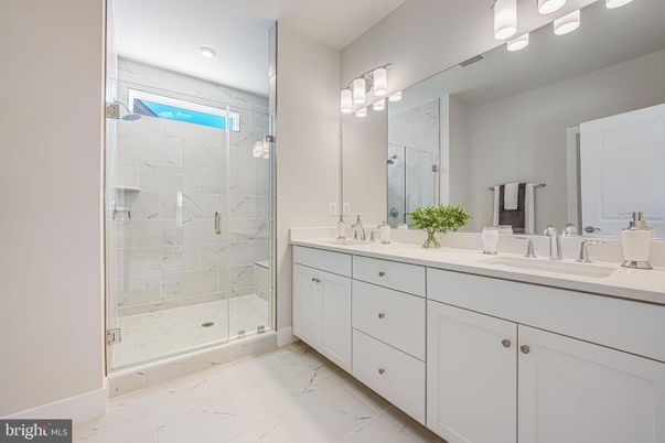 Bathroom, Dual Sink Vanities, Glass Shower, Interior, Marble, Marble Walls, Recessed Lighting