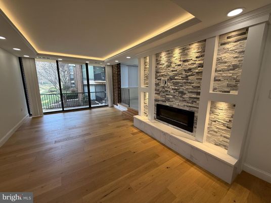 Fireplace, Interior, Recessed Lighting, Stone Walls, Wood Texture Flooring