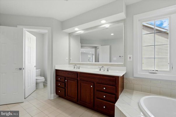 Bathroom, Dual Sink Vanities, Interior, Recessed Lighting, Tile Countertops