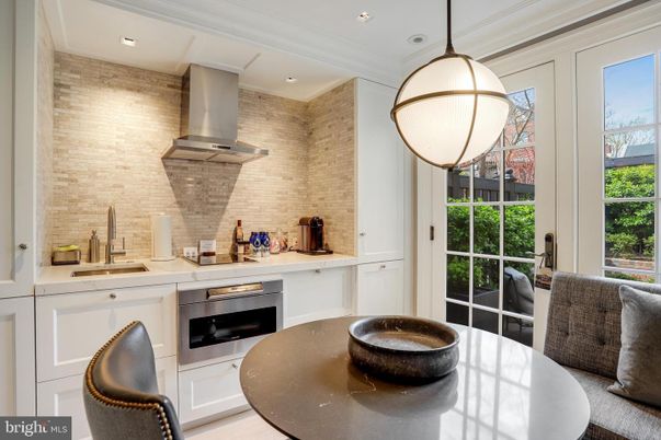 Interior, Kitchen, Pendant Lights, Recessed Lighting, Stainless Steel Appliances, Stone Walls