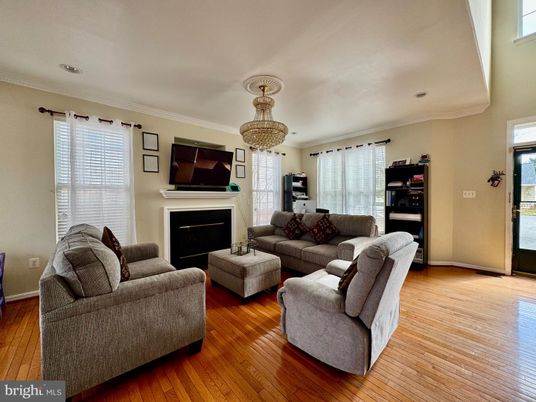 Chandelier, Fireplace, Interior, Living room, Recessed Lighting, Wood Texture Flooring