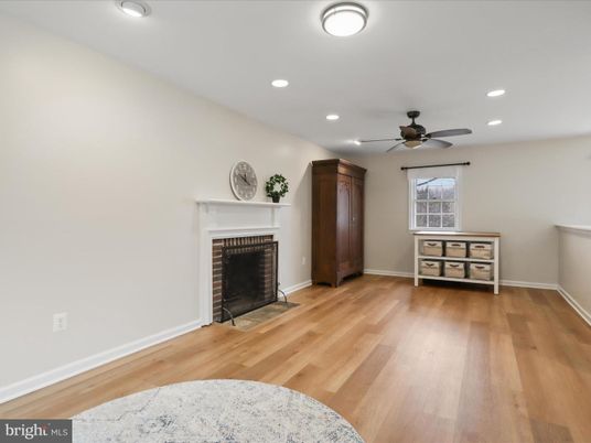 Empty room, Fireplace, Interior, Recessed Lighting, Wood Texture Flooring