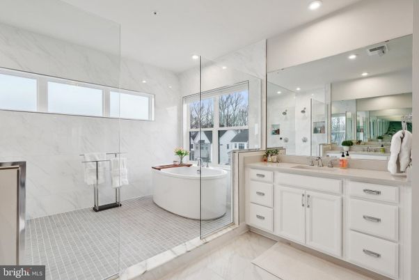 Bathroom, Dual Sink Vanities, Glass Shower, Interior, Marble, Marble Walls, Recessed Lighting