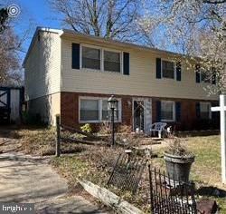 Exterior, Facade, Brick Facade, Raised Ranch