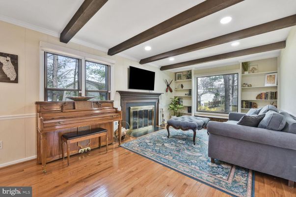 Fireplace, Interior, Living room, Piano, Recessed Lighting, Wooden Beams, Wood Texture Flooring