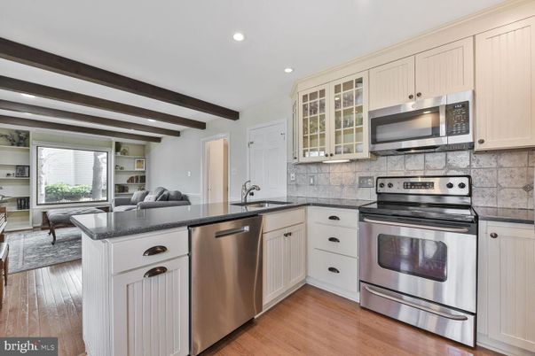 Dining room, Interior, Kitchen, Recessed Lighting, Stainless Steel Appliances, Wooden Beams, Wood Texture Flooring