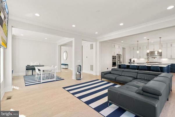 Dining room, Interior, Kitchen, Living room, Pendant Lights, Recessed Lighting, Stainless Steel Appliances, Wood Texture Flooring