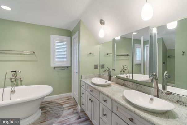 Bathroom, Dual Sink Vanities, Free Standing Baths, Interior, Recessed Lighting, Wood Texture Flooring