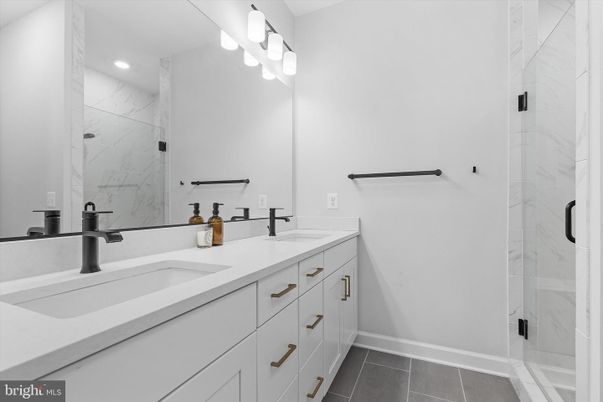 Bathroom, Dual Sink Vanities, Glass Shower, Interior, Marble Walls, Recessed Lighting