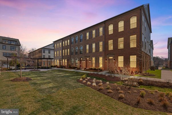 Backyard, Exterior, Facade, Brick Facade, Condo Building