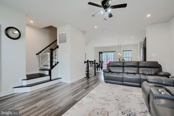 Home Theatre Room, Dining room, Interior, Living room, Pendant Lights, Recessed Lighting, Wood Texture Flooring