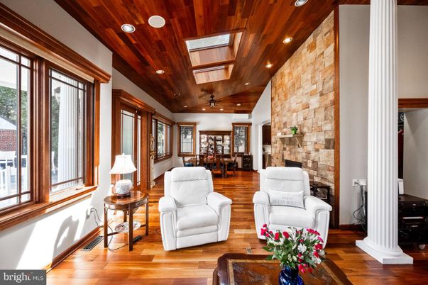 Fireplace, Interior, Living room, Recessed Lighting, Stone Walls, Wooden Ceilings, Wood Texture Flooring