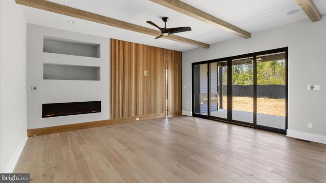 Empty room, Fireplace, Interior, Recessed Lighting, Wooden Beams, Wood Texture Flooring