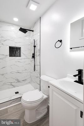 Bathroom, Interior, Marble Walls, Recessed Lighting, Wood Texture Flooring