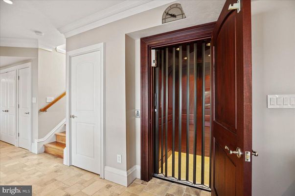 Elevator, Interior, Recessed Lighting, Wood Texture Flooring