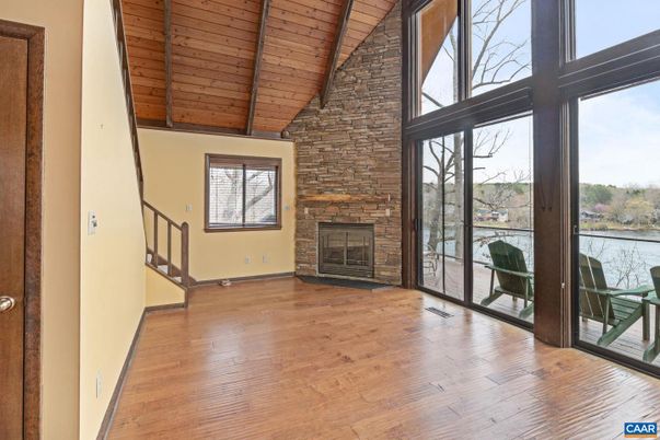 Empty room, Fireplace, Interior, Stone Walls, Wooden Ceilings, Wood Texture Flooring