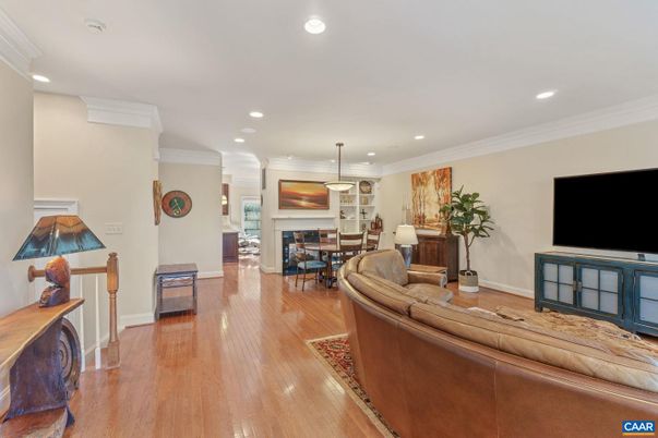 Dining room, Fireplace, Interior, Living room, Pendant Lights, Recessed Lighting, Wood Texture Flooring