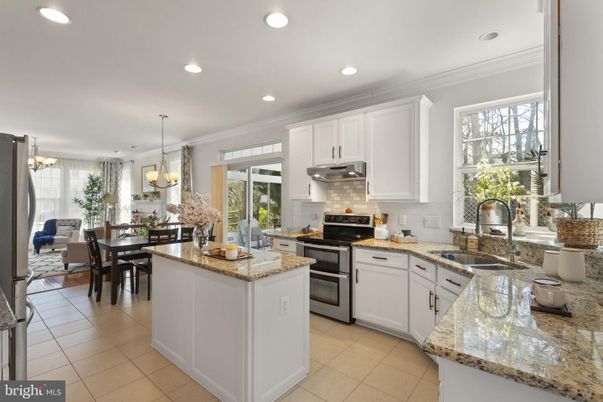 Chandelier, Dining room, Interior, Kitchen, Pendant Lights, Recessed Lighting, Stainless Steel Appliances