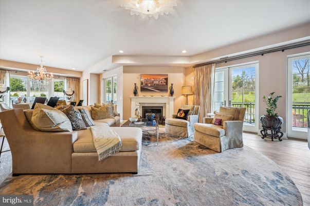Chandelier, Dining room, Fireplace, Interior, Living room, Recessed Lighting, Wood Texture Flooring