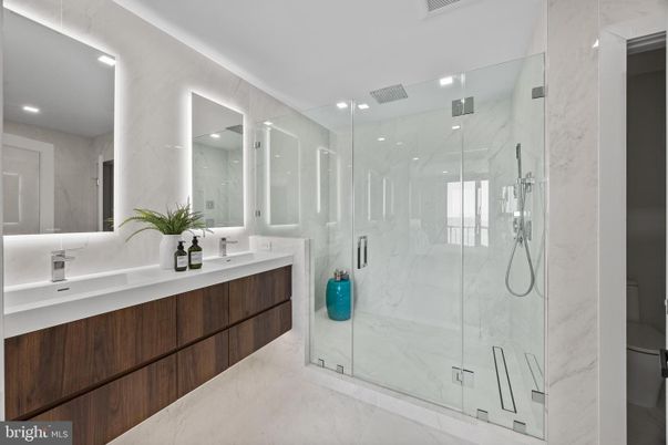 Bathroom, Dual Sink Vanities, Glass Shower, Interior, Marble Walls, Recessed Lighting