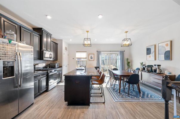 Dining room, Interior, Kitchen, Pendant Lights, Recessed Lighting, Stainless Steel Appliances, Wood Texture Flooring