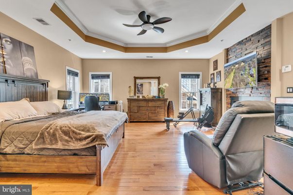 Bedroom, Fitness Equipment, Interior, Recessed Lighting, Stone Walls, Wood Texture Flooring