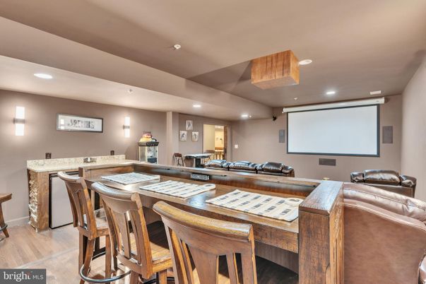 Interior, Projection Screen, Recessed Lighting, Theatre Room, Wood Texture Flooring