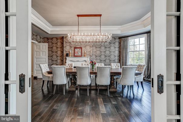 Chandelier, Dining room, Fireplace, Interior, Stone Walls, Wood Texture Flooring