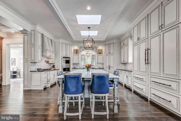 Chandelier, Interior, Kitchen, Pendant Lights, Recessed Lighting, Stainless Steel Appliances, Wood Texture Flooring