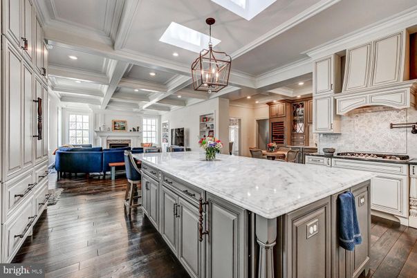 Chandelier, Dining room, Fireplace, Interior, Kitchen, Living room, Pendant Lights, Recessed Lighting, Wood Texture Flooring